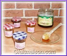 Pots de miels aromatisés aux H.E.